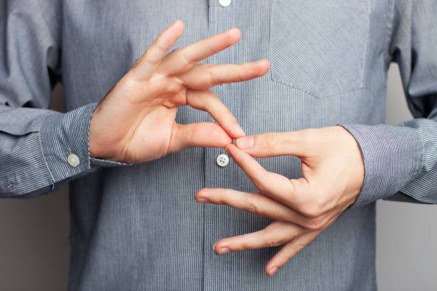 man showing word interpreter, closeup view. american sign language. asl concept - american sign language imagens e fotografias de stock