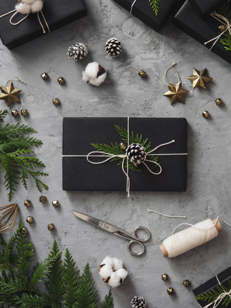 istock Christmas presents wrapped in black paper 1182244870