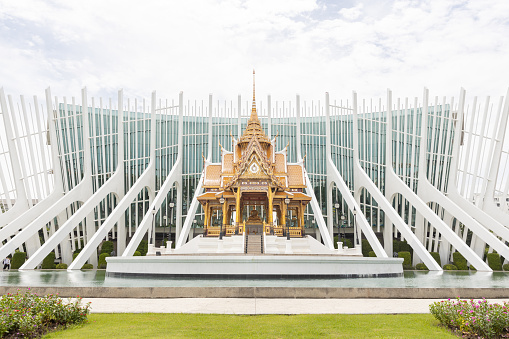 Pathum Thani, Thailand - September 19, 2019 : exterior view of Ganesha center student education building with beautiful architecture golden pavilion and garden at Rangsit University(RSU).