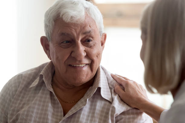 istock Close up view focus on elderly patient communicates with nurse 1182248585