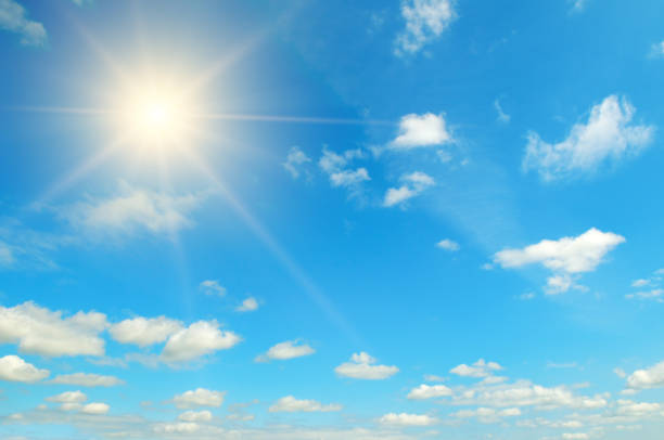 istock Couds in the blue sky. Bright midday sun illuminates the space. 1182251465