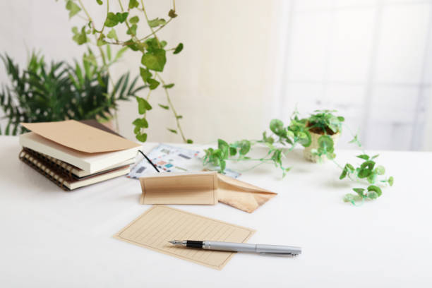 istock Blank brown letter and pen 1182258432