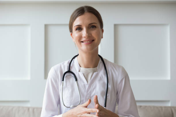 istock Female doctor talking with patient provide help distantly through internet 1182259798