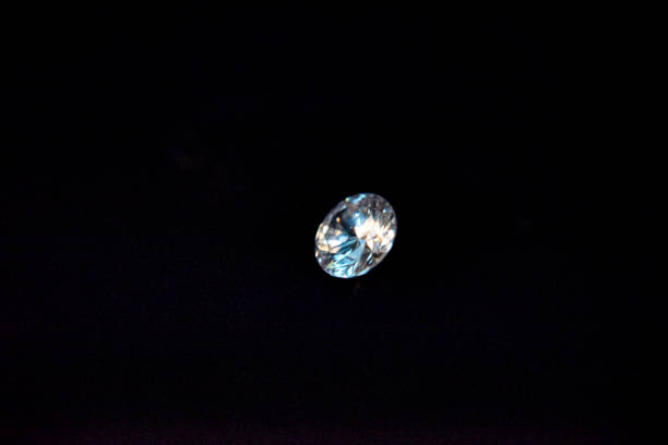 istock one diamond of classic shape on the black background 1182262271