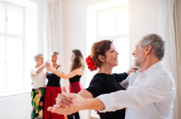 istock Group of senior people in dancing class with dance teacher. 1182263477