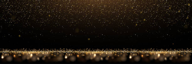 istock Gold glitter and shiny golden rain on black background. Vector horizontal luxury background. 1182268586