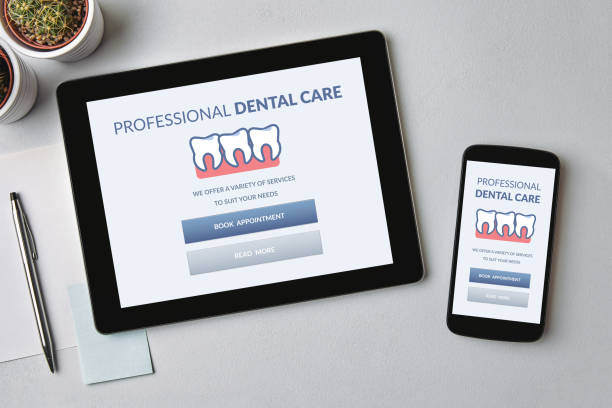 istock Dental care concept on tablet and smartphone screen 1182269609