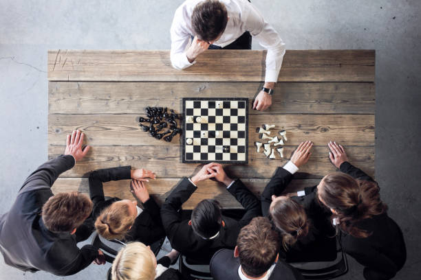 istock Business people playing chess 1182269625