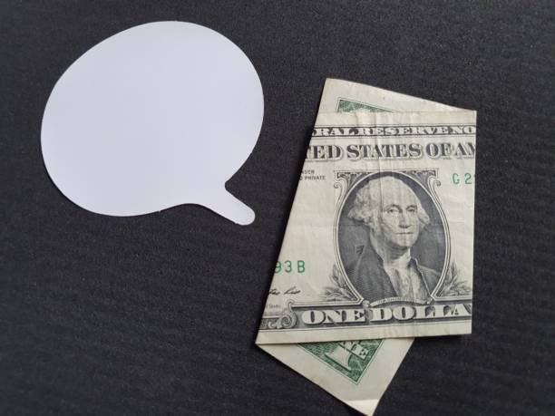 istock business conversation, American one dollar bill and dialogue icon 1182270595