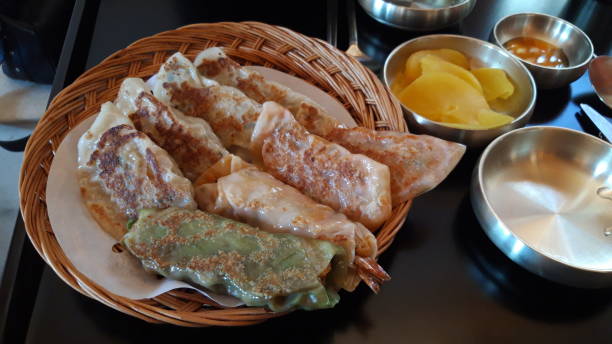 istock baked dumplings and tteokbokki 1182272644