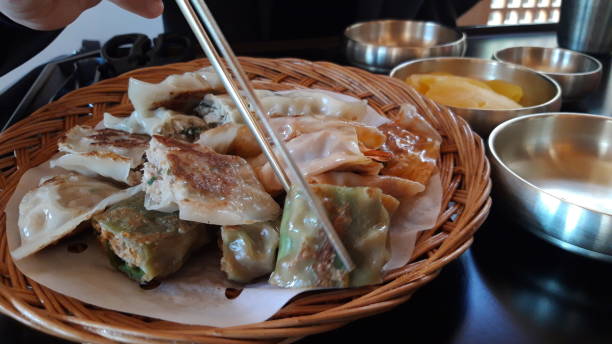 istock baked dumplings and tteokbokki 1182272654