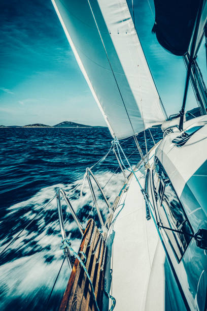 istock Sailing with sailboat at sunset 1182272685