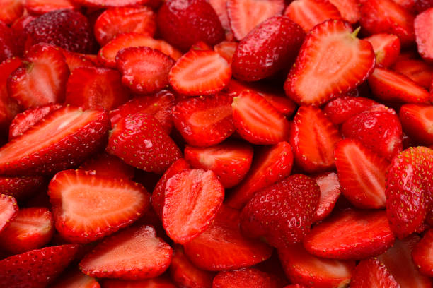 istock Strawberry slices. Fresh berries macro. Fruit background. Top view. 1182273575