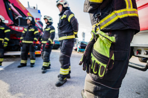 istock Firefighters standing by the Fire truck 1182273781