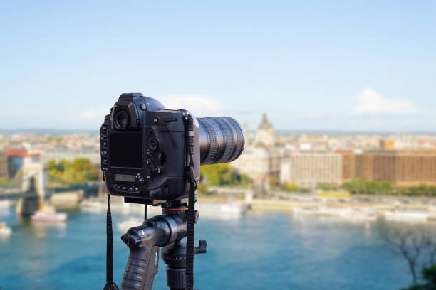 istock Modern camera photographs the city concept. 1182274540