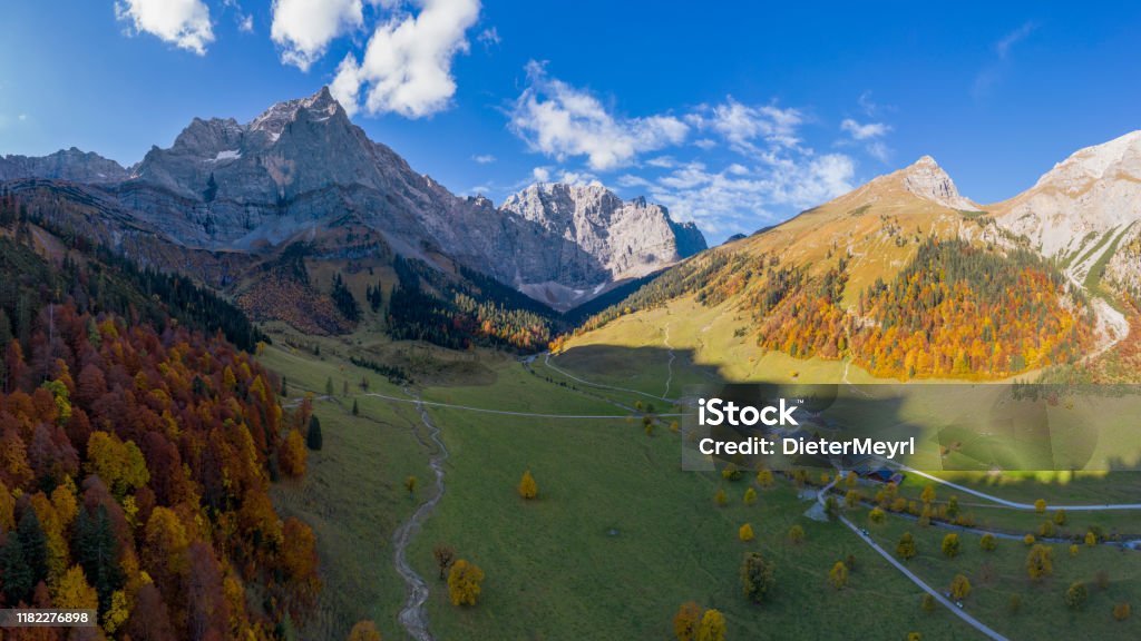 Aerial panorama of Ahornboden, Karwendel mountains, Tyrol, Austria Autumn, Alps, Woodland, Season Aerial View Stock Photo