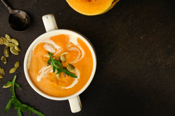 istock pumpkin soup (first course, delicious vegetable vitamin food) menu concept. food background. copy space. Top view 1182285016