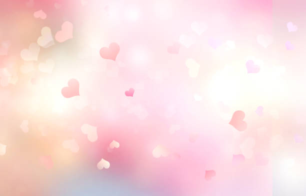 istock Valentine's day blurred hearts pink background,romantic abstract bokeh texture.Illustration. 1182286108