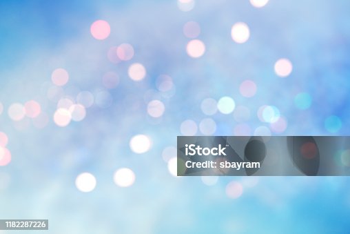 istock Abstract blurred soft blue beautiful glowing blinking bokeh 1182287226