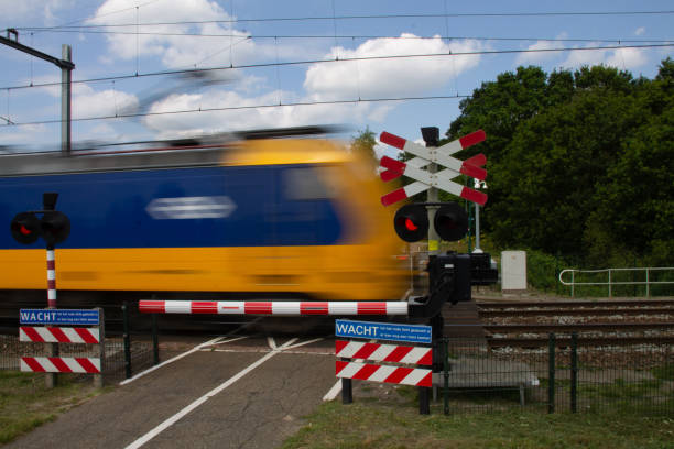 istock Bicycle crossing with a train crossing 1182287313
