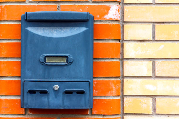 istock A beautiful mailbox hangs waiting for newspapers, parcels and letters. 1182287353