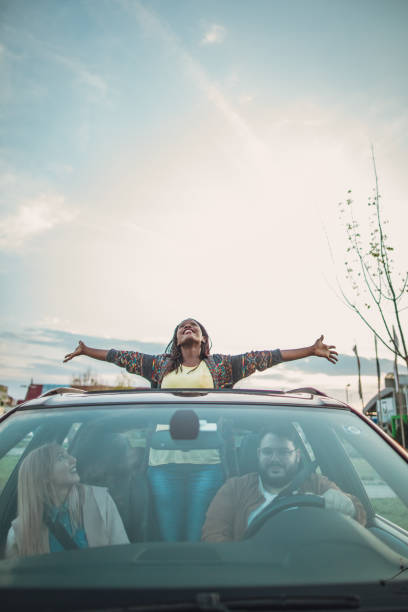 istock Cheerful friends having fun on a road trip 1182288505