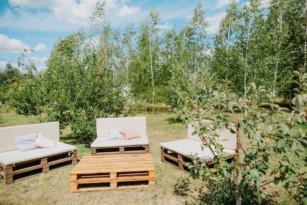 istock loft lounge area wooden sofas activity garden 1182289840