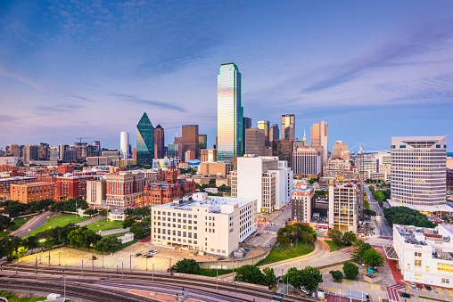 Dallas, Texas, USA downtown city skyline at twilight.