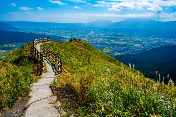 istock road in the mountains, Aso, Kumamoto 1182290611