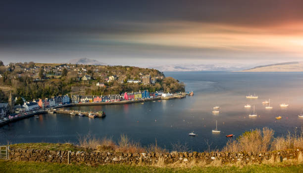 Beautiful sunrise over Tobermory Bay on the Isle of Mull. stock photo