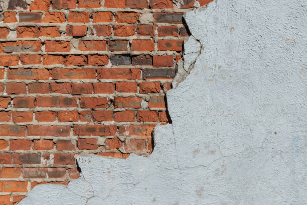 istock Brick wall with concrete elements. Old red brick wall. Red brick. Stone wall. Textures brick wall. 1182293416