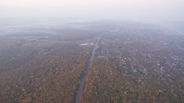 istock Autumn forest aerial view at sunset. 1182294318