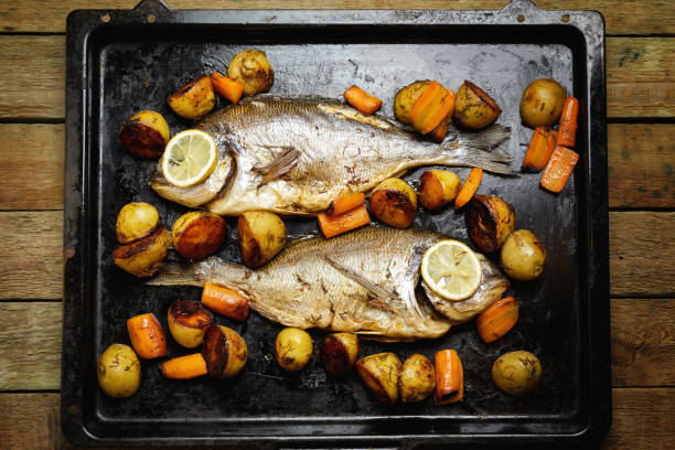 istock Baked Dorado fish with vegetables 1182299095