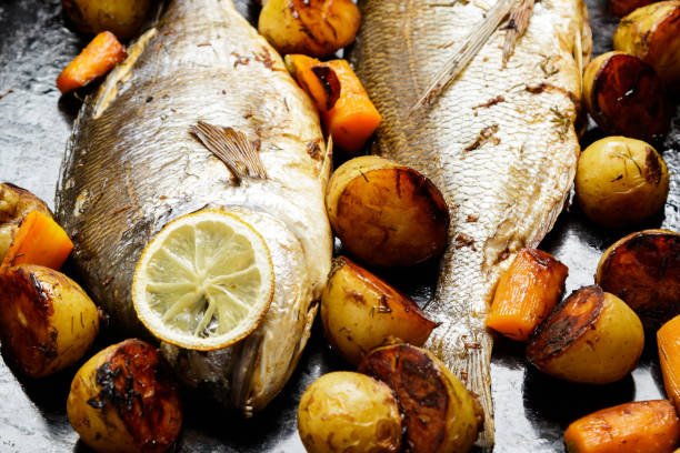istock Baked Dorado fish with vegetables 1182299225