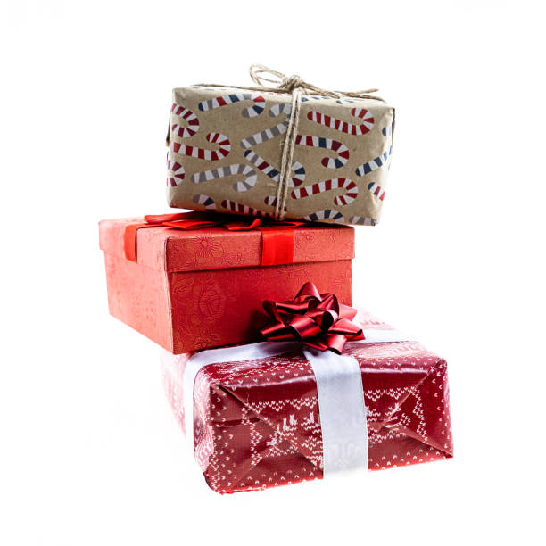 istock closeup stack high gift present ribbon bow craft gift christmas isolated background 1182302117
