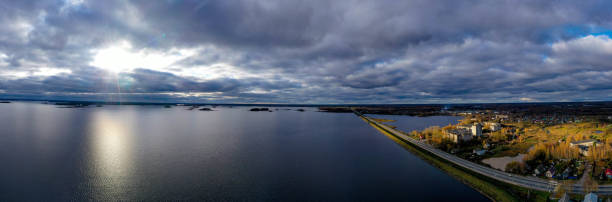 istock Panorama aerial highway through water. Highway antenna 1182302881