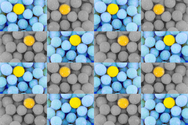 istock contrasting pattern blue yellow candy ball container symmetrical geometric background 1182302999