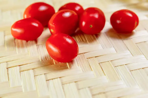 red cherry tomatoes bright juicy vegetables wooden background closeup