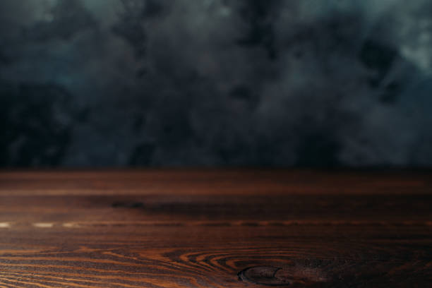 istock Dark wood and concrete blurred background in loft style as wallpaper or backdrop for design 1182306456