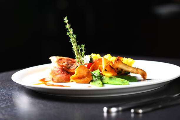 istock food on a plate, ready to be served to guests 1182309703