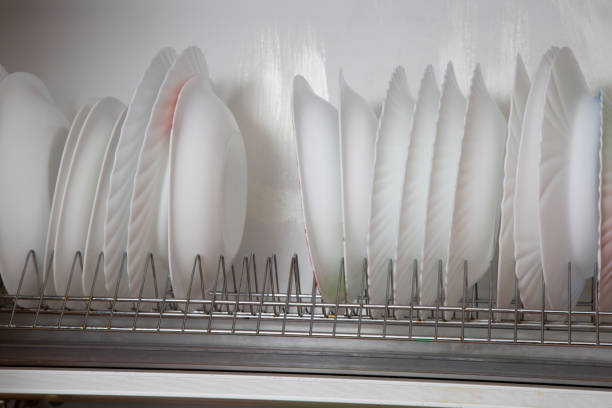 Dishwasher with washed dishes. Repair of dishwashers.