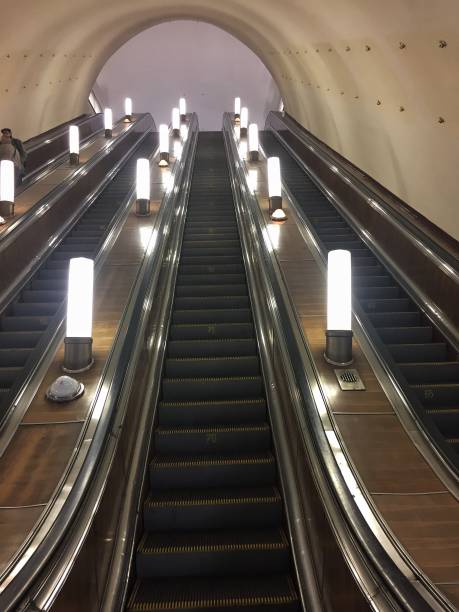 istock escalator with lights at the metro station 1182310807