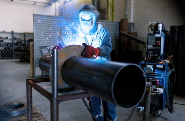 istock İndustrial worker welding on the pipe 1182312330