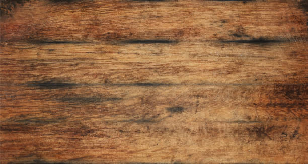 Old aged brown wooden planks background texture Vecror illustration of vintage brown barrel wooden planks background texture with scratches and black stains over wood grain of old aged oak barrel wood background stock illustrations