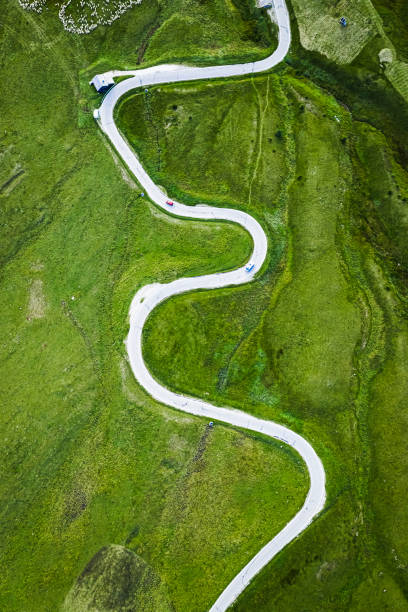istock White serpentine on green hills in Dolomites 1182317852