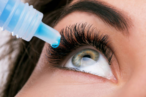 Woman and eye drops Close up of female face and eye drops glaucoma photos stock pictures, royalty-free photos & images