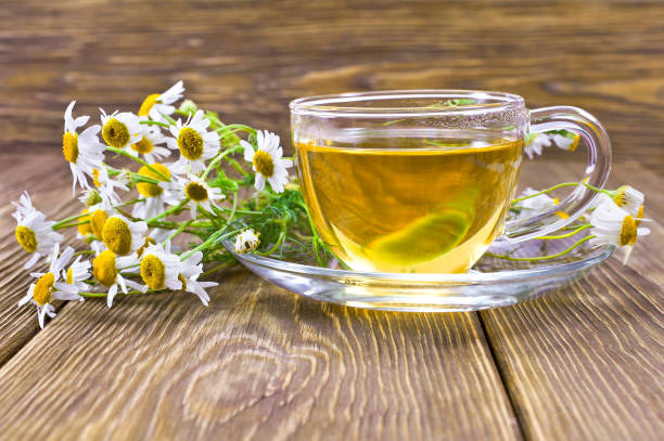 istock Herbal tea with bouquet of chamomile 1182319138