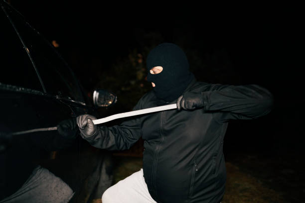 istock Car Burglar in the Action 1182323213