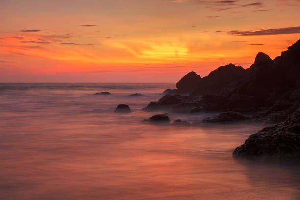 istock Sunset on Varkala beach, Kerala, India 1182327289