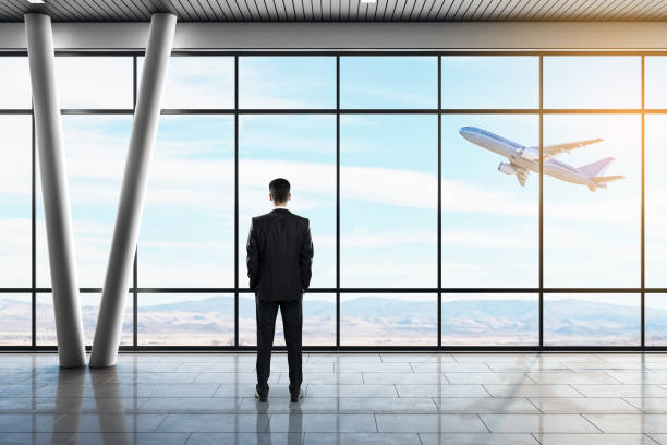 istock Businessman in airport 1182327324